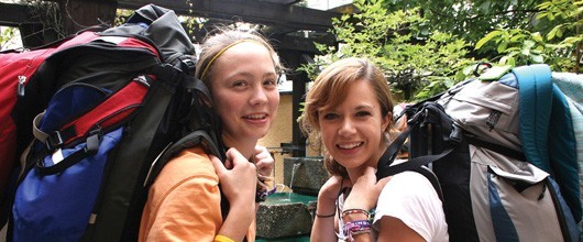 Girl Scout Travel Girl Scouts traveling with their full backpacks
