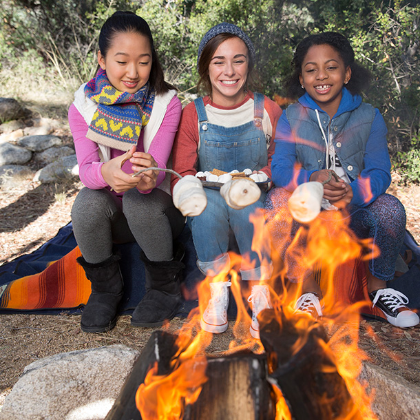 Girls roasting marshmellos