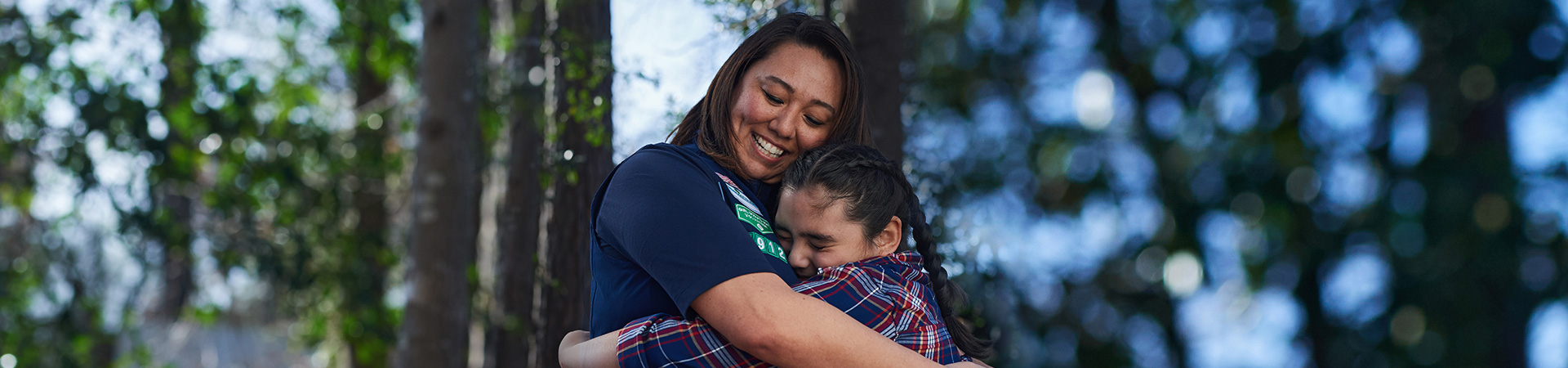  Mother and daughter hugging 